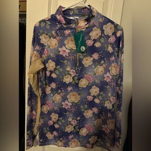 It’s a haggerty’s floral sunshirt large